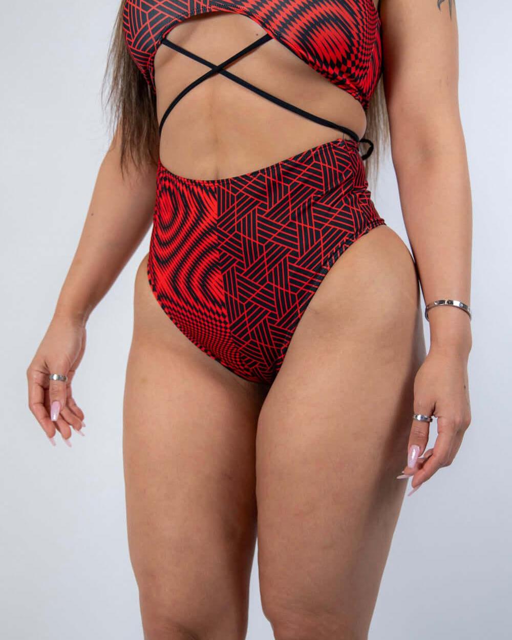 Amplitude High Waisted Bikini Bottoms in red and black abstract design, perfect for rave outfits and bold summer looks.