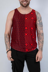 Model wearing Amplitude Men's Tank Top with abstract red and black pattern, perfect for rave outfits.