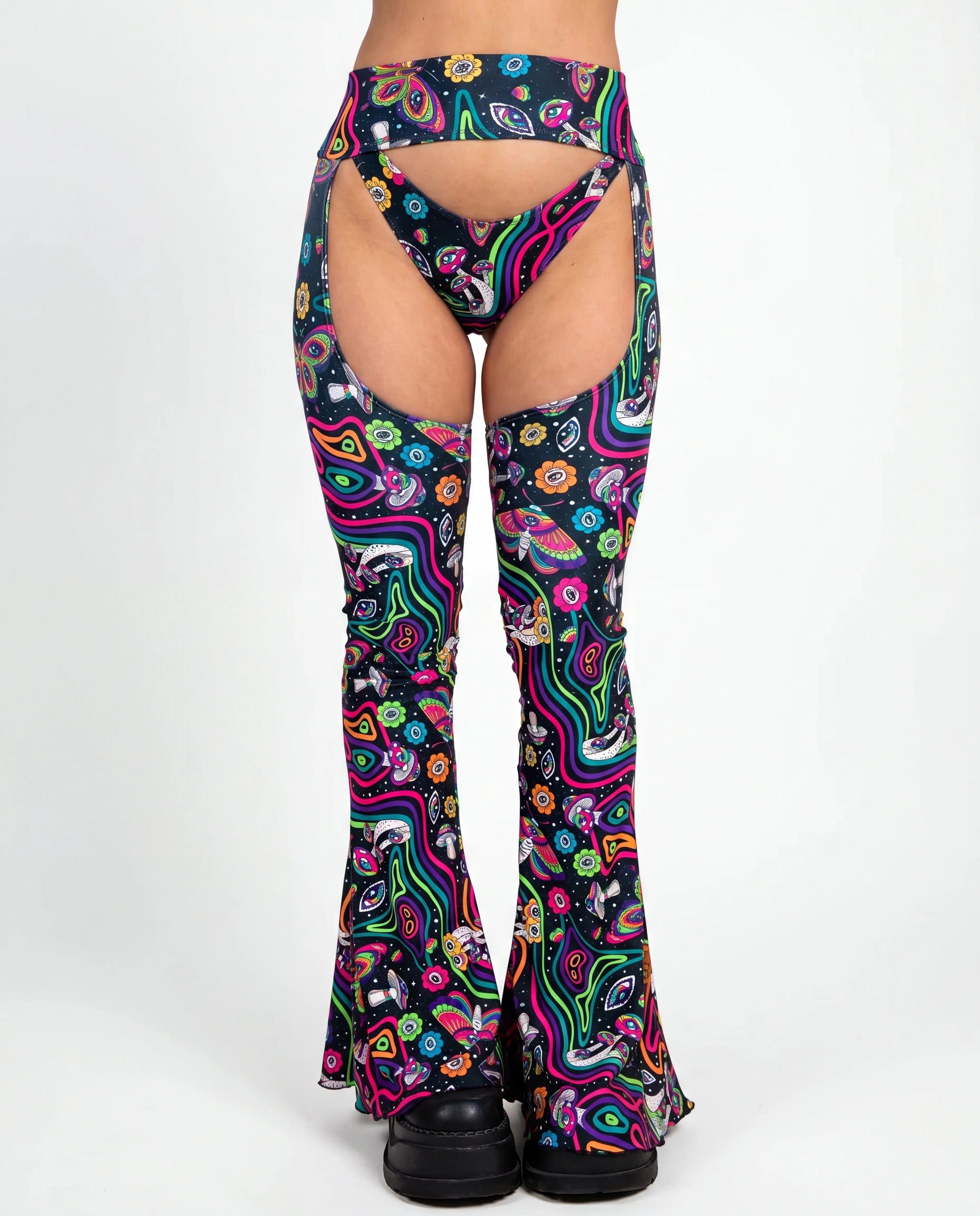 Awaken Bell Chaps from the back, featuring a vibrant psychedelic pattern with mushrooms and eyes, perfect for a rave festival. — cyc_4