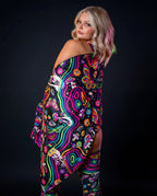 Awaken Festival Scarf in a psychedelic pattern, draped over a model's side, perfect for rave festival fashion. — black