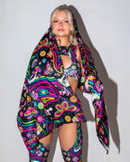 Awaken Festival Scarf in a psychedelic pattern, draped over a model's side, perfect for rave festival fashion. — cyc_5