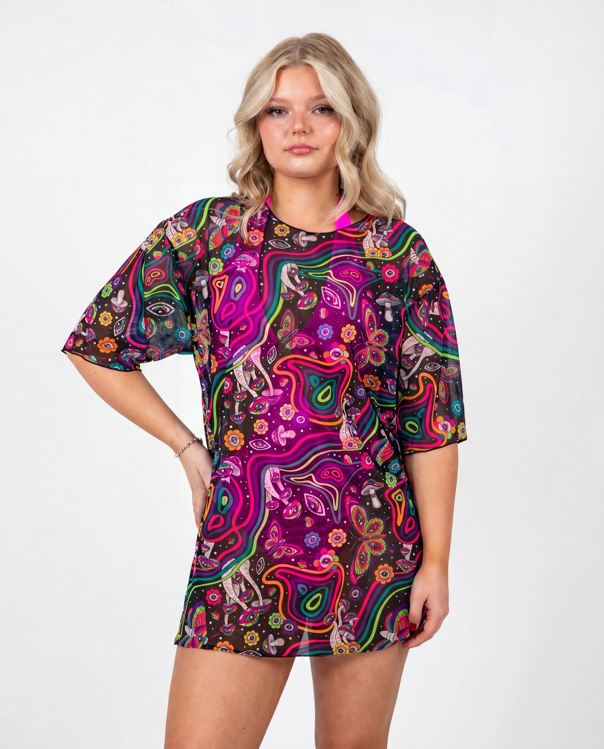 Awaken Mesh Oversized Tee front view, a vibrant psychedelic rave top with a black belt and silver chains. — cyc_4