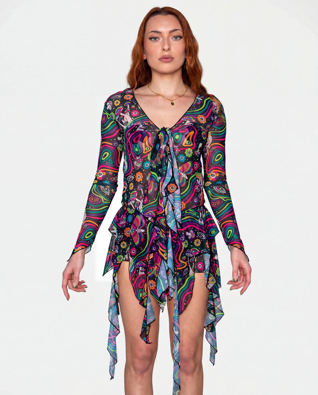 Awaken Sea Fairy Tie Top shown from the front on a model, featuring a sheer, long-sleeved, psychedelic multi-color rave top over a pink bodysuit. — cyc_6