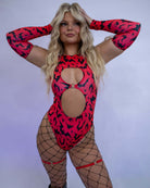 Model wearing Batty Arm Sleeves - UV Red paired with a matching outfit, great for rave outfits.