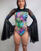 Model wearing colorful rave outfit with black mesh hooded bell sleeves, perfect for music festivals and parties.