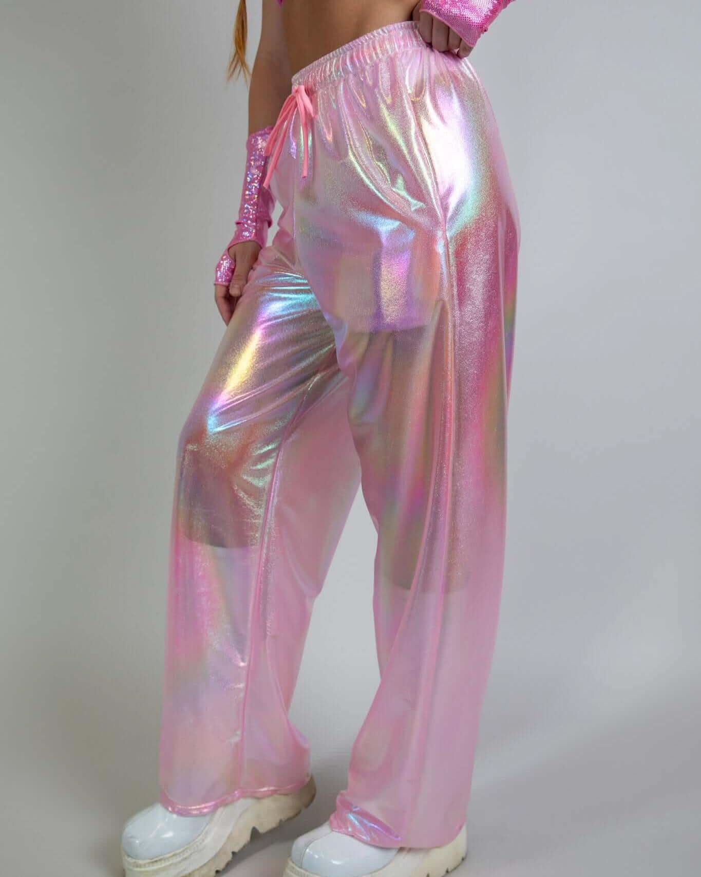 Iridescent pink Bubble Gum Lucy Pants in a baggy style, perfect for trendy rave outfits and stylish comfort.