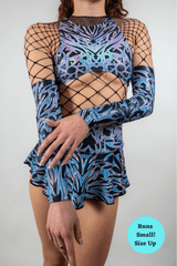 Model showcasing holographic Chromium Arm Sleeves with a cyber sigalism design, perfect for rave outfits and clothing.
