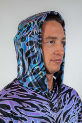 Model wearing the Chromium Assassin Hood, featuring a sleek cyber sigalism print and a futuristic hooded design.