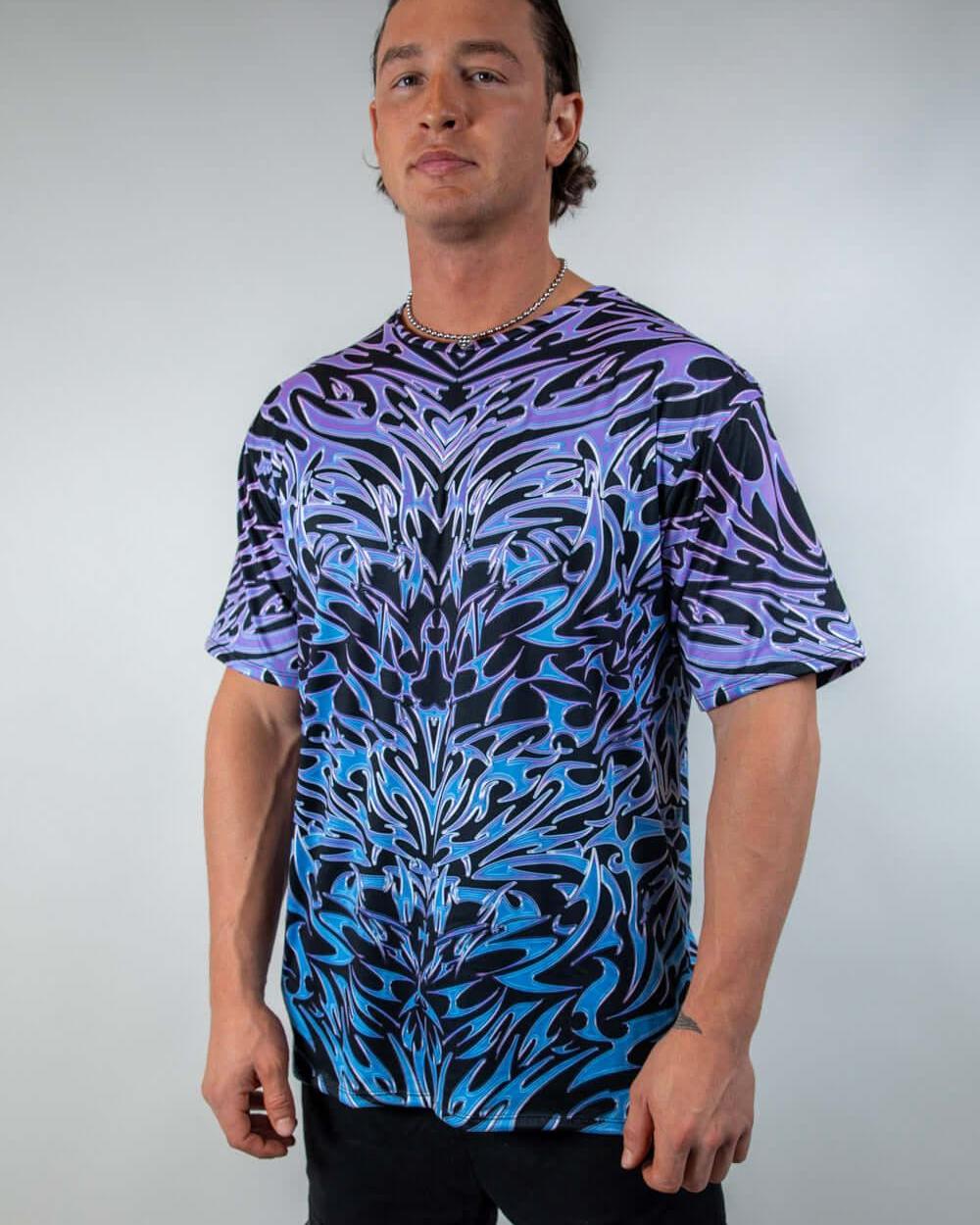 Model wearing the Chromium Oversized Softee, a cyber sigalism print T-shirt with a loose, comfortable fit.