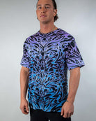 Model wearing the Chromium Oversized Softee, a cyber sigalism print T-shirt with a loose, comfortable fit.