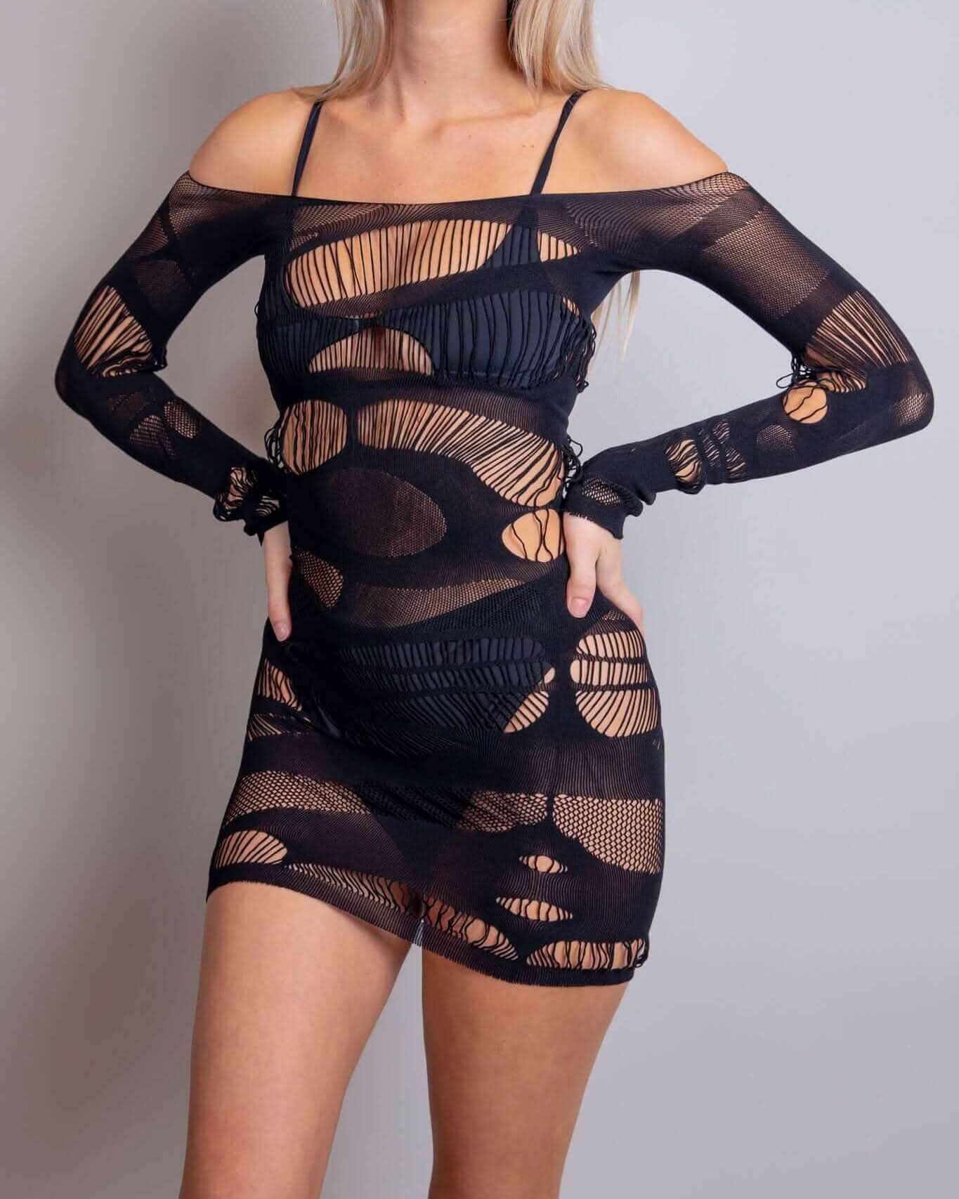 Dark Dimensions fishnet dress with off-the-shoulder style, perfect for rave outfits and edgy looks.