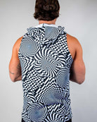 Back view of a man wearing a Distortion Tank Top with Hood, featuring a black and white abstract optical design, perfect for rave outfits.