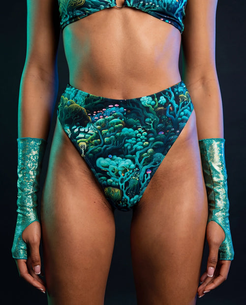 Faewood high waisted rave pants thong in teal forest print with matching festival outfit top
