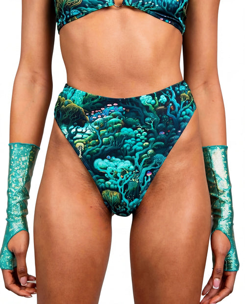 Faewood high waisted rave pants thong in teal forest print with matching festival outfit top — white