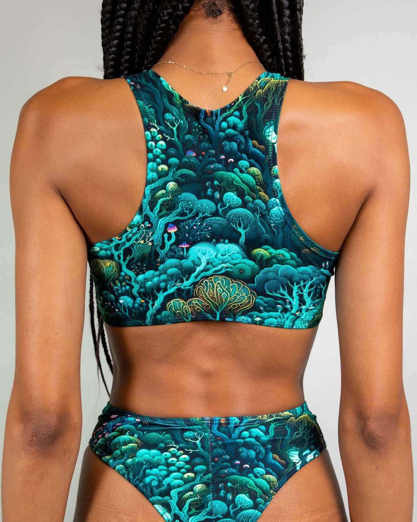 Faewood rave top back view showing keyhole cutout and racer back design in teal mystical forest print