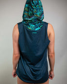 Back view of Faewood Tank Top with Hood, featuring vibrant enchanted forest design, perfect for rave outfits.
