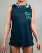 Faewood Tank Top with Hood featuring a vibrant forest design and mock pocket, perfect for rave outfits.