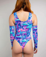 Fairycore High Neck Bodysuit in vibrant blue and pink print, featuring long sleeves and a thong back for rave outfits.