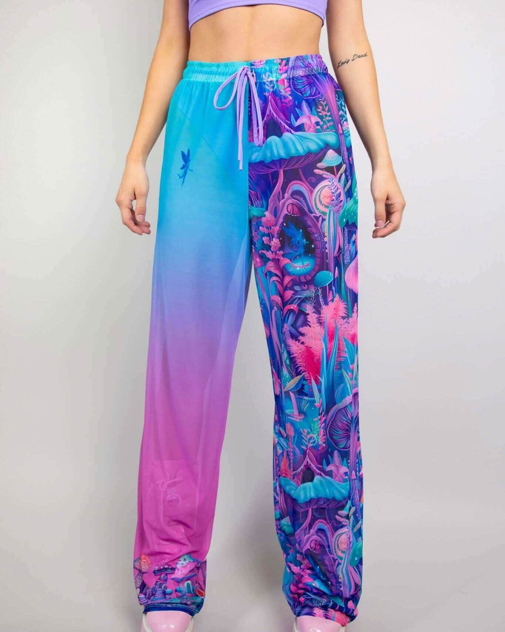 Fairycore Mesh Lucy Pants in vibrant pink and blue, featuring a whimsical print, perfect for rave outfits and relaxation.