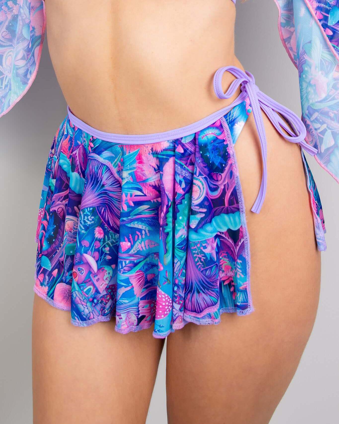 Vibrant fairycore mesh swirl skirt with tropical print, perfect for rave outfits and stylish layering options.