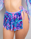 Vibrant fairycore mesh swirl skirt with tropical print, perfect for rave outfits and stylish layering options.