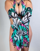 Model showcasing Flutter Metamorphosis Sleeves with vibrant butterfly design, perfect for rave outfits and stylish clothing.