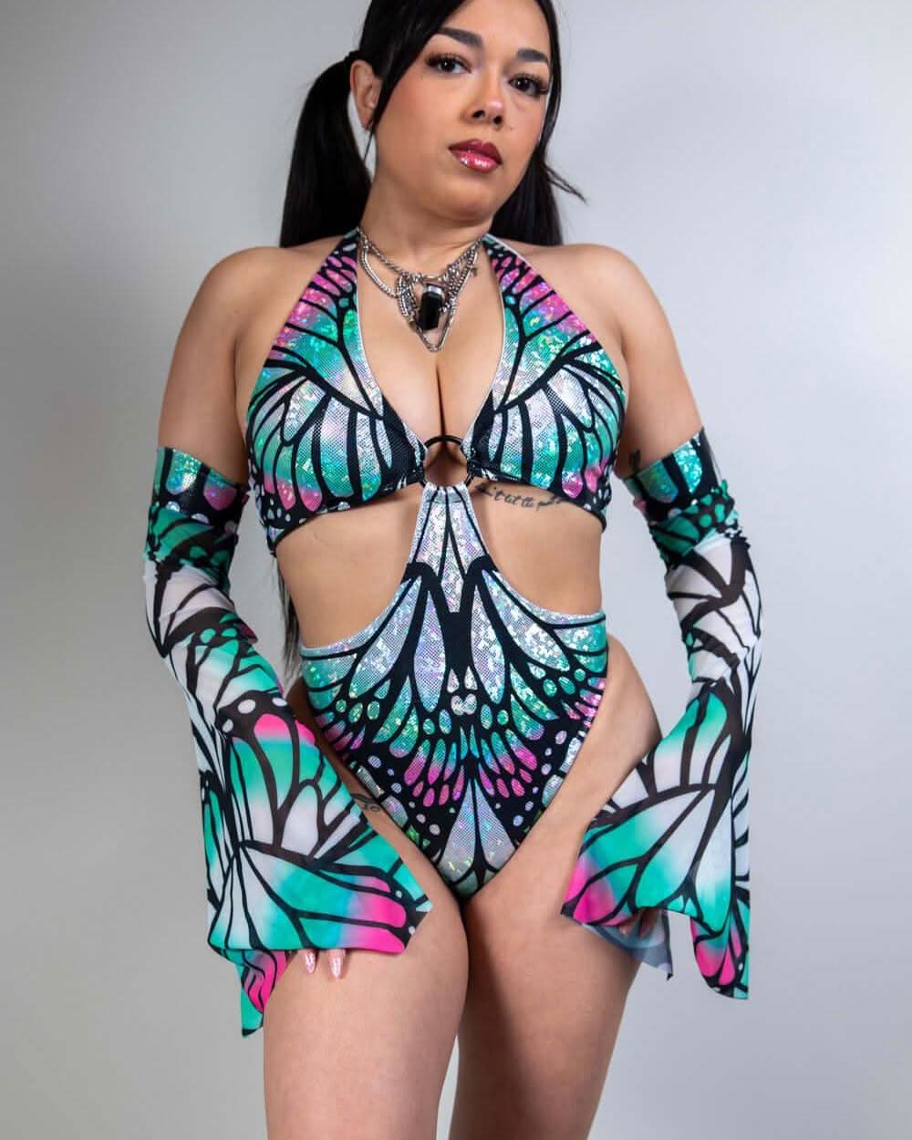 Model showcasing Flutter Metamorphosis Sleeves with butterfly pattern, perfect for rave outfits and trendy clothing.