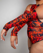 Red dragon print rave arm sleeves with strategic slits modeled in festival outfit pose