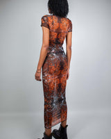 Model showcasing Fossil Mesh Baby Tee Maxi Dress, a stylish and breathable outfit perfect for raves or nightclubs.