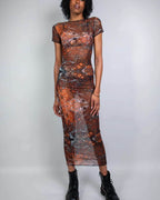 Brown fossil print mesh maxi dress rave bodysuit worn by model in front pose for festival outfit