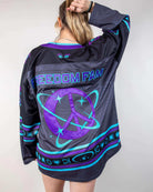 Freedom Fam limited edition hockey jersey featuring vibrant purples and blues, perfect for rave outfits.