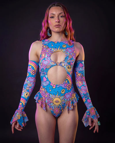 Groovy Keyhole Bodysuit front view, featuring a vibrant psychedelic pattern with smiley faces and peace signs, perfect for rave festivals.
