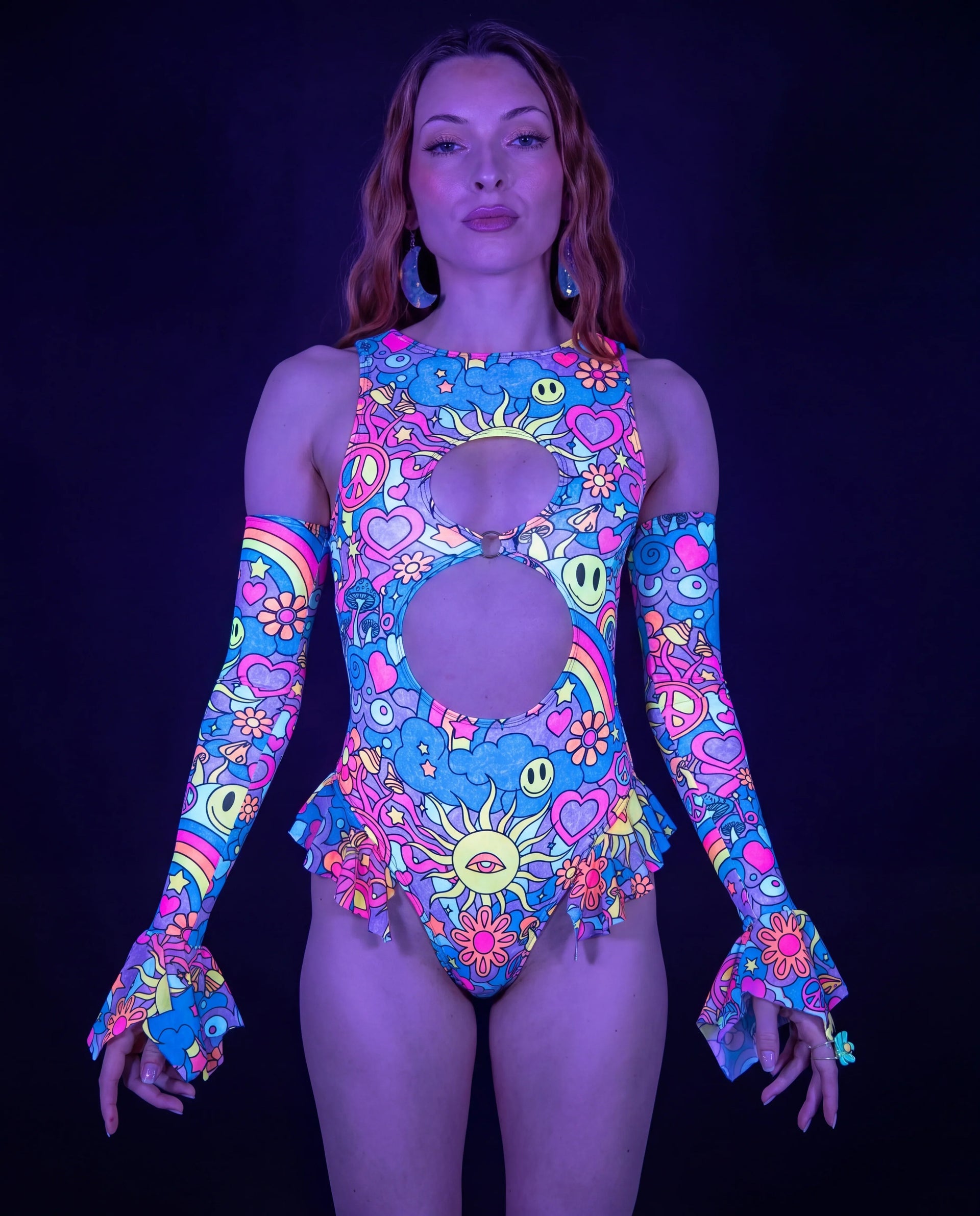 Groovy Keyhole Bodysuit front view, featuring a vibrant psychedelic pattern with smiley faces and peace signs, perfect for rave festivals. — UV blacklight