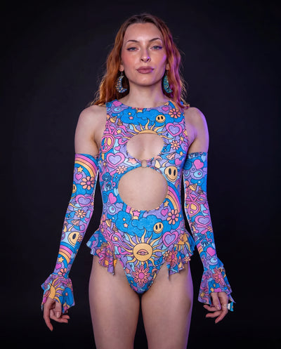 Groovy Spellcaster Arm Sleeves on a model, front view, showcasing the vibrant pastel psychedelic rave print.
