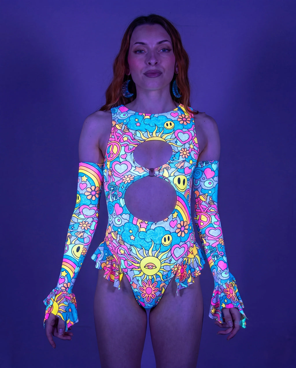 Groovy Spellcaster Arm Sleeves on a model, front view, showcasing the vibrant pastel psychedelic rave print. — UV blacklight