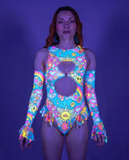 Groovy Spellcaster Arm Sleeves on a model, front view, showcasing the vibrant pastel psychedelic rave print. — UV blacklight