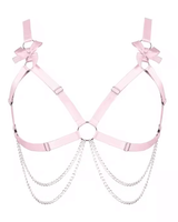 Heartthrob Harness in light pink with bows and chain detailing, perfect for bold rave outfits.