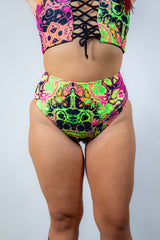 High waisted bikini bottoms in vibrant trippy UV design, perfect for rave outfits and flattering comfort.