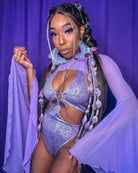 Model showcasing lavender mesh bell sleeves with a sparkling bodysuit, perfect for rave outfits and ethereal looks.