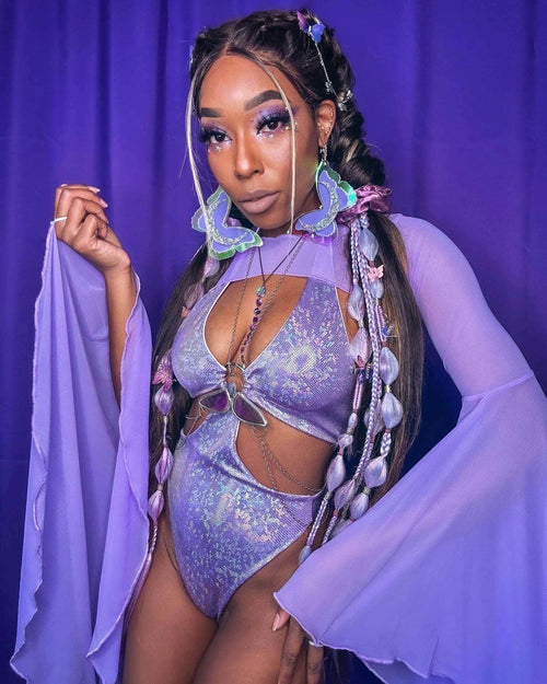 Model showcasing lavender mesh bell sleeves with a sparkling bodysuit, perfect for rave outfits and ethereal looks.