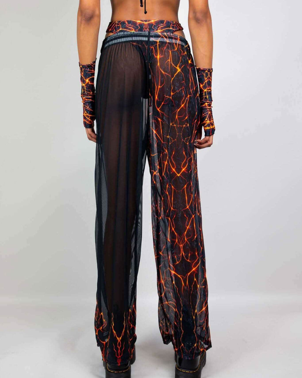 Magma Mesh Lucy Pants with lava print, back view showcasing breathable mesh fabric and wide-leg design, perfect for rave outfits.