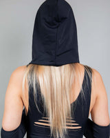 Matte black hood with chain worn by a model, perfect for rave outfits and festival protection.