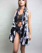 Model showcasing Mechanoid Reversible Festival Scarf paired with stylish rave outfit, perfect for festival season.