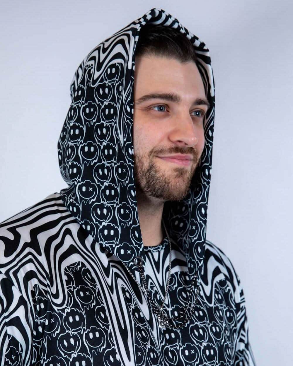 Side profile of the Meltdown Assassin Hood, showing off the curved hem and melty design with a relaxed smile.