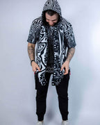 Model standing with the Meltdown Festival Scarf draped and hooded, showcasing a relaxed festival look.