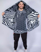 Wide shot of the Meltdown Festival Scarf held out like wings, revealing its full printed surface and breathable material.