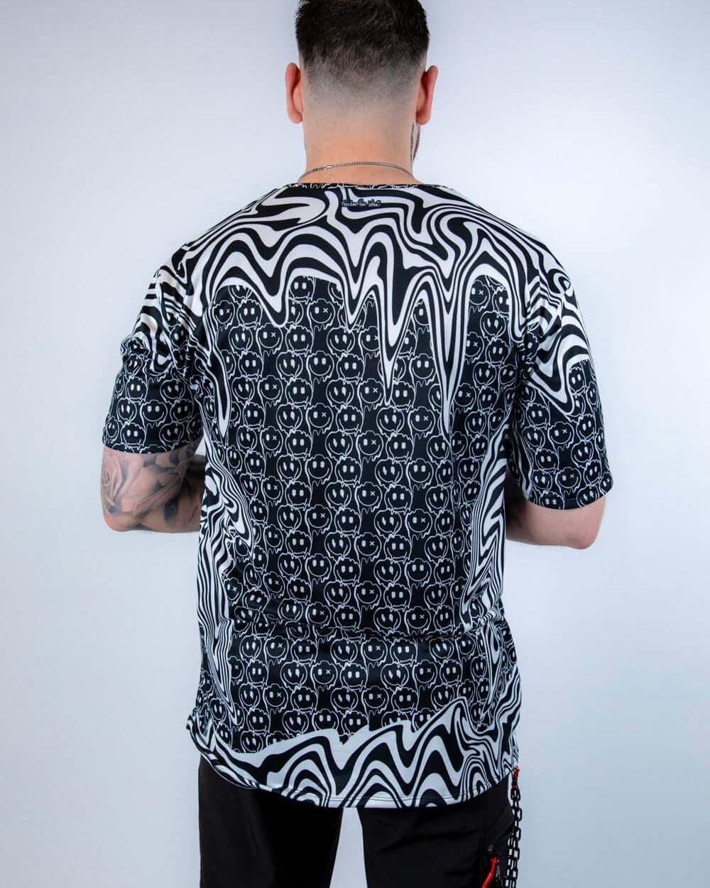 Back view of the Meltdown Oversized Softee, showcasing the full drape of the oversized fit and all-over trippy print.