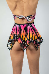 Back view of a UV reactive Monarch Fairy Skirt with butterfly print, perfect for rave outfits and clothing.