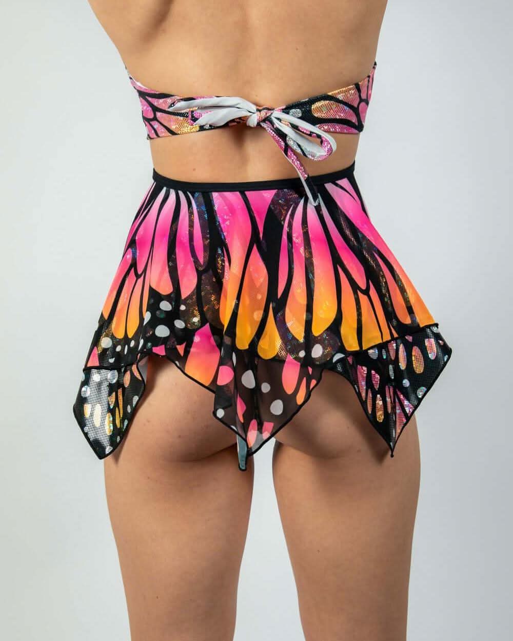 Back view of a UV reactive Monarch Fairy Skirt with butterfly print, perfect for rave outfits and clothing.