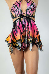Monarch Fairy Skirt featuring butterfly print in vibrant colors, perfect for rave outfits and playful fashion.